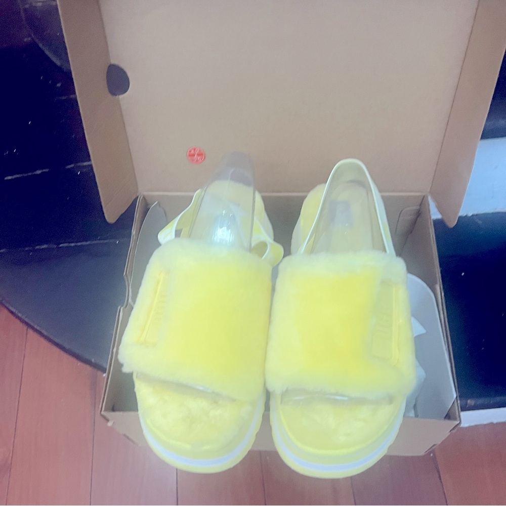 Uggs Disco Slide in yellow. Size 11 women.